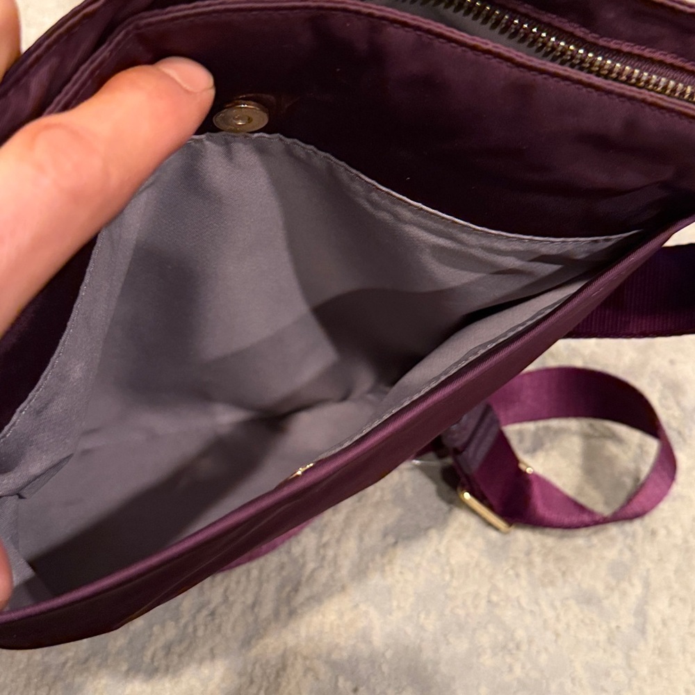 TUMI
Voyageur Capri Crossbody plum purple color in GUC - Picture 9 of 12
